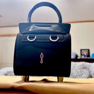 Christian Louboutin Paloma nano black and red. Small enough for concerts, etc.